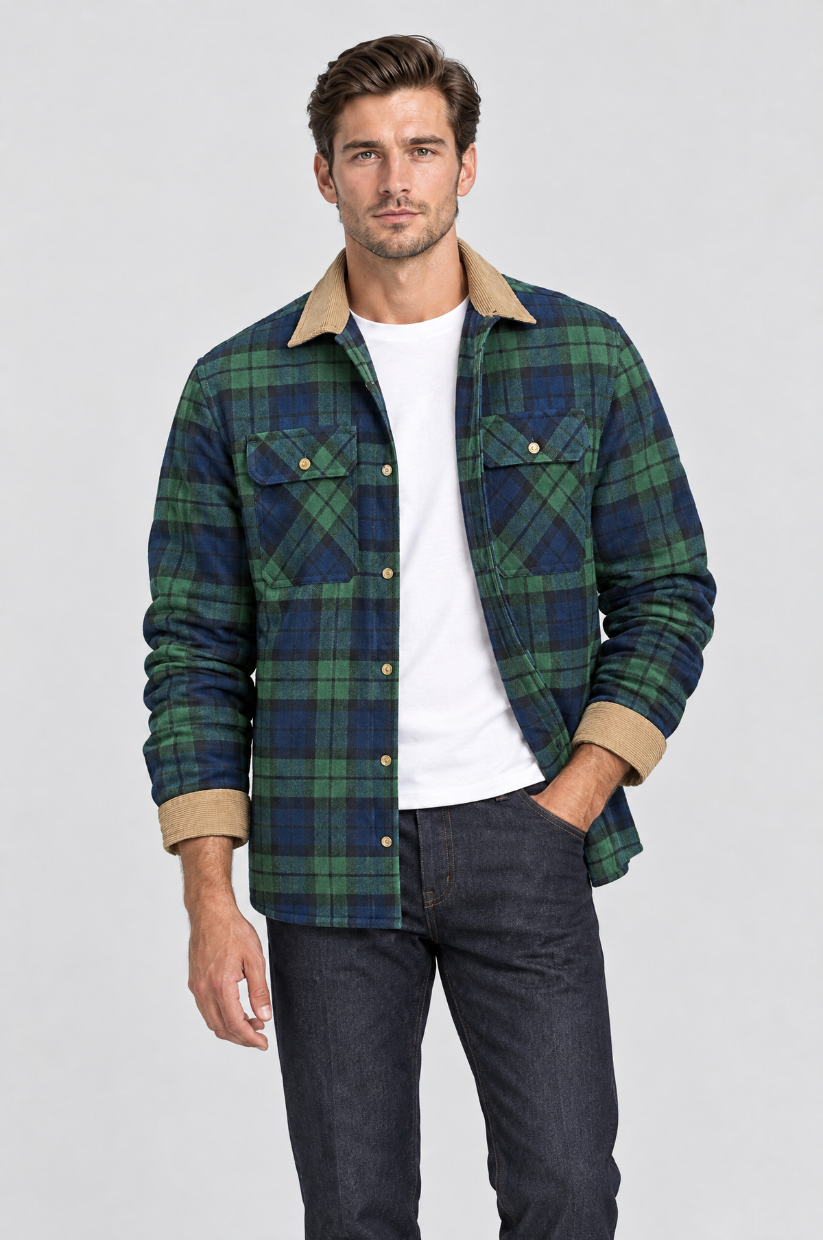Man layering a check shacket in winter