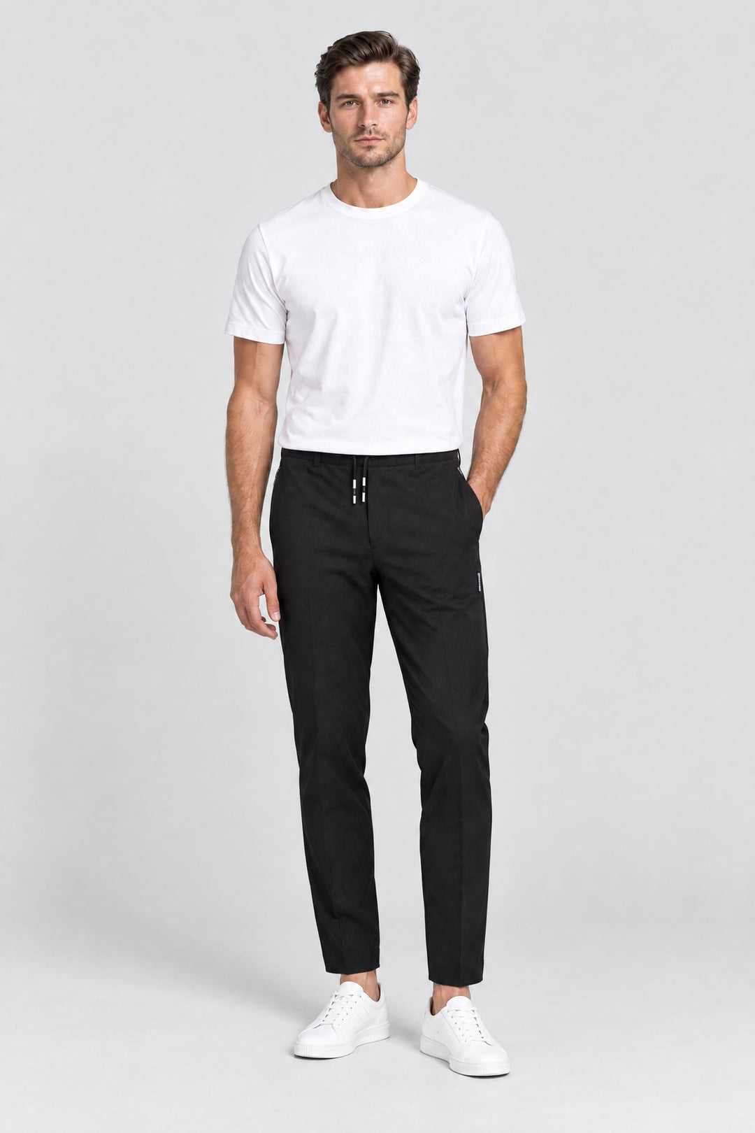 The Camden Tech Trouser in Black worn by model