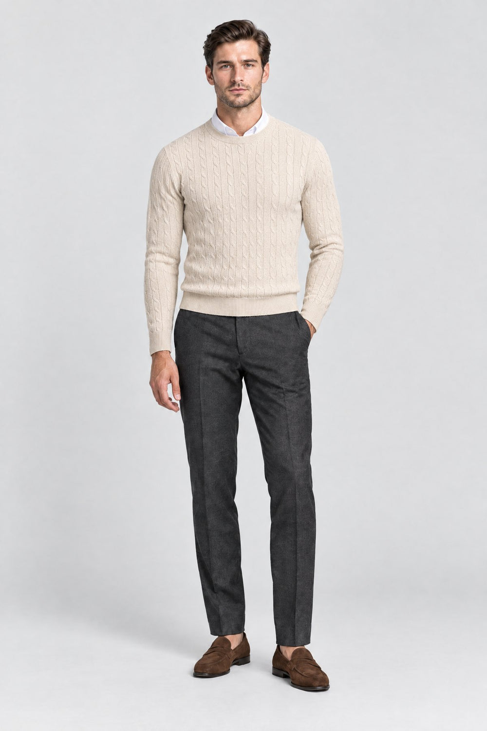 The Cotswold Cable Crewneck in Oat, on model