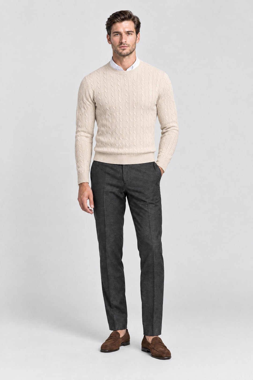 The Cotswold Cable Crewneck in Oat, on model