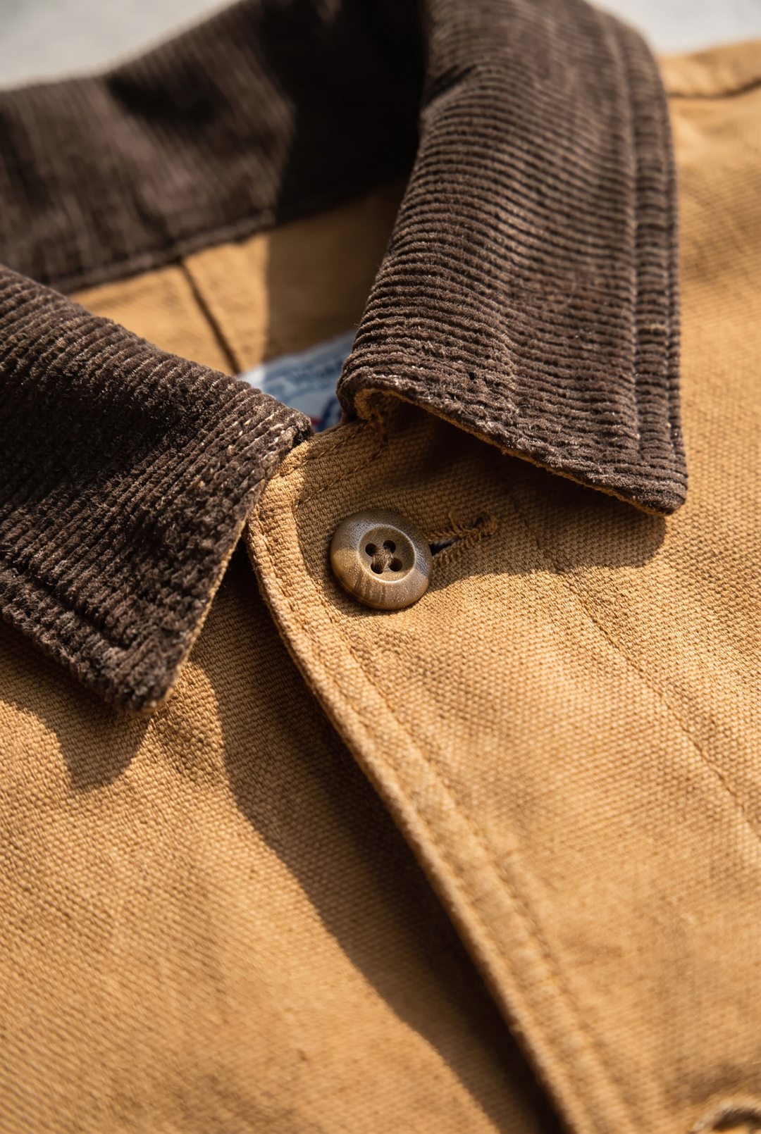 Corduroy collar and button detail on The Deptford chore jacket