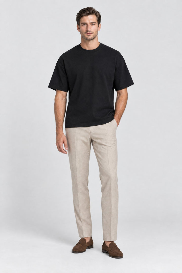 The Essential Heavyweight Tee in Black worn by model — full length