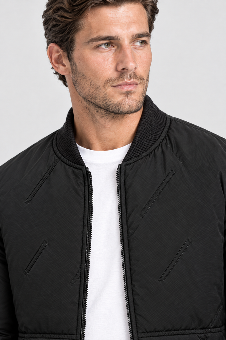 The Fulham Padded Bomber in Black, close-up detail