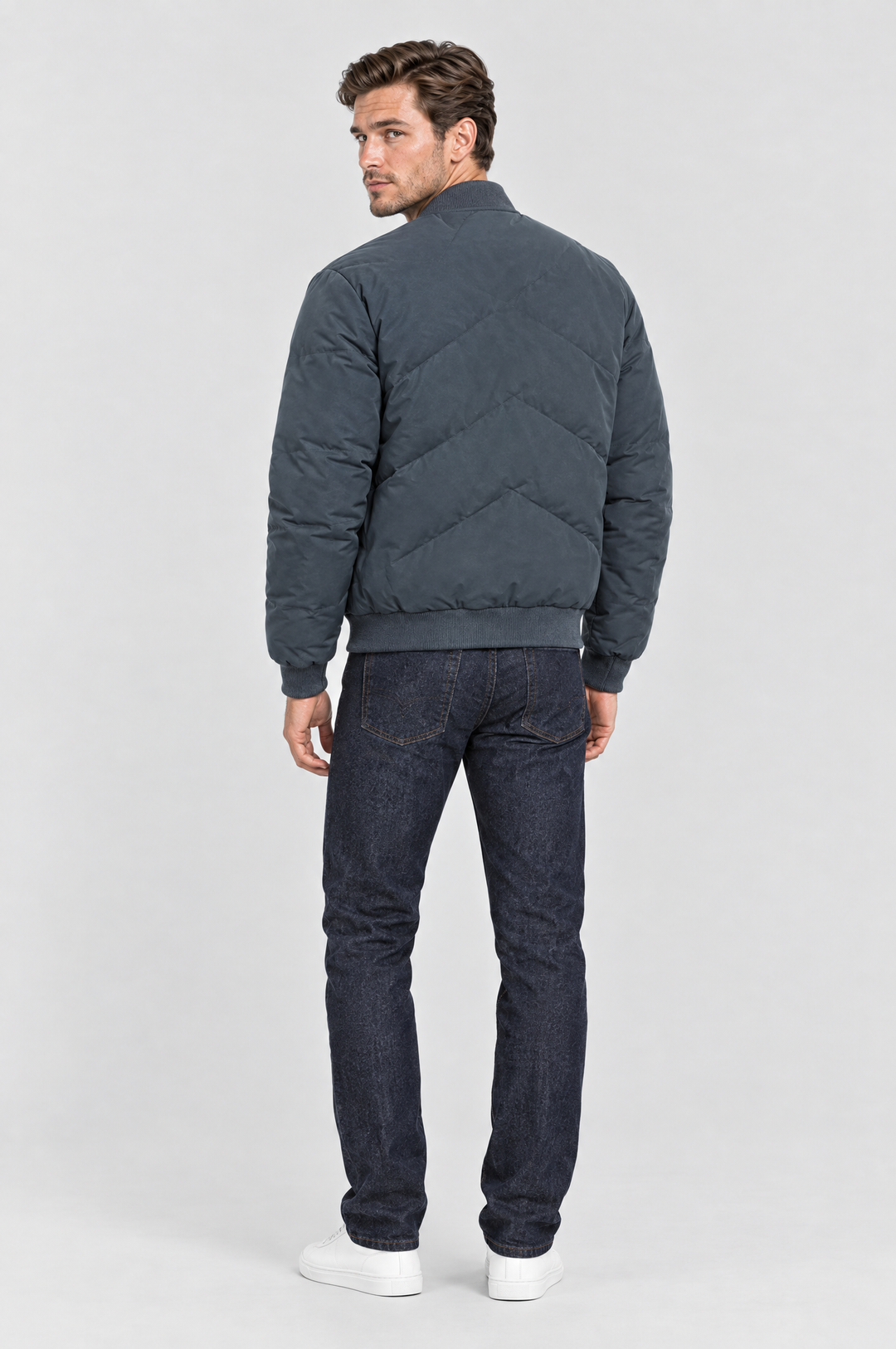 The Fulham Padded Bomber in Slate Blue, on model, back view