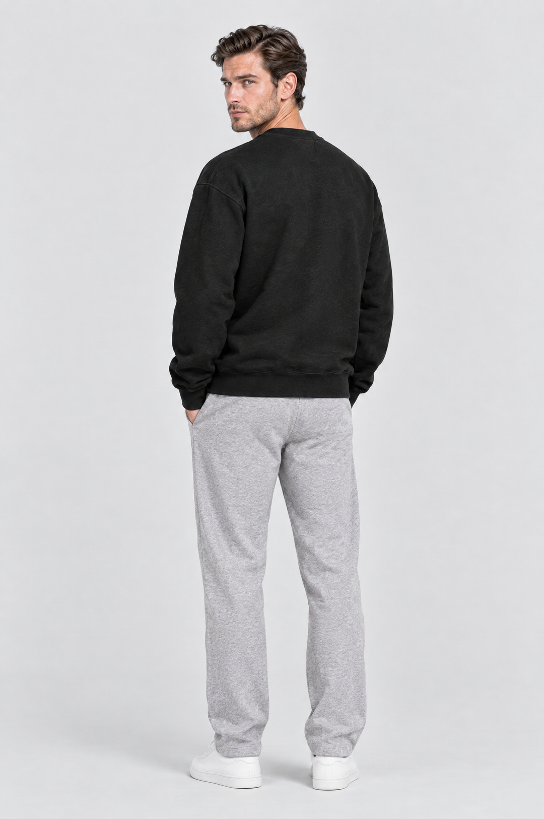 The Hackney Crewneck Sweatshirt in Black, on model, back view