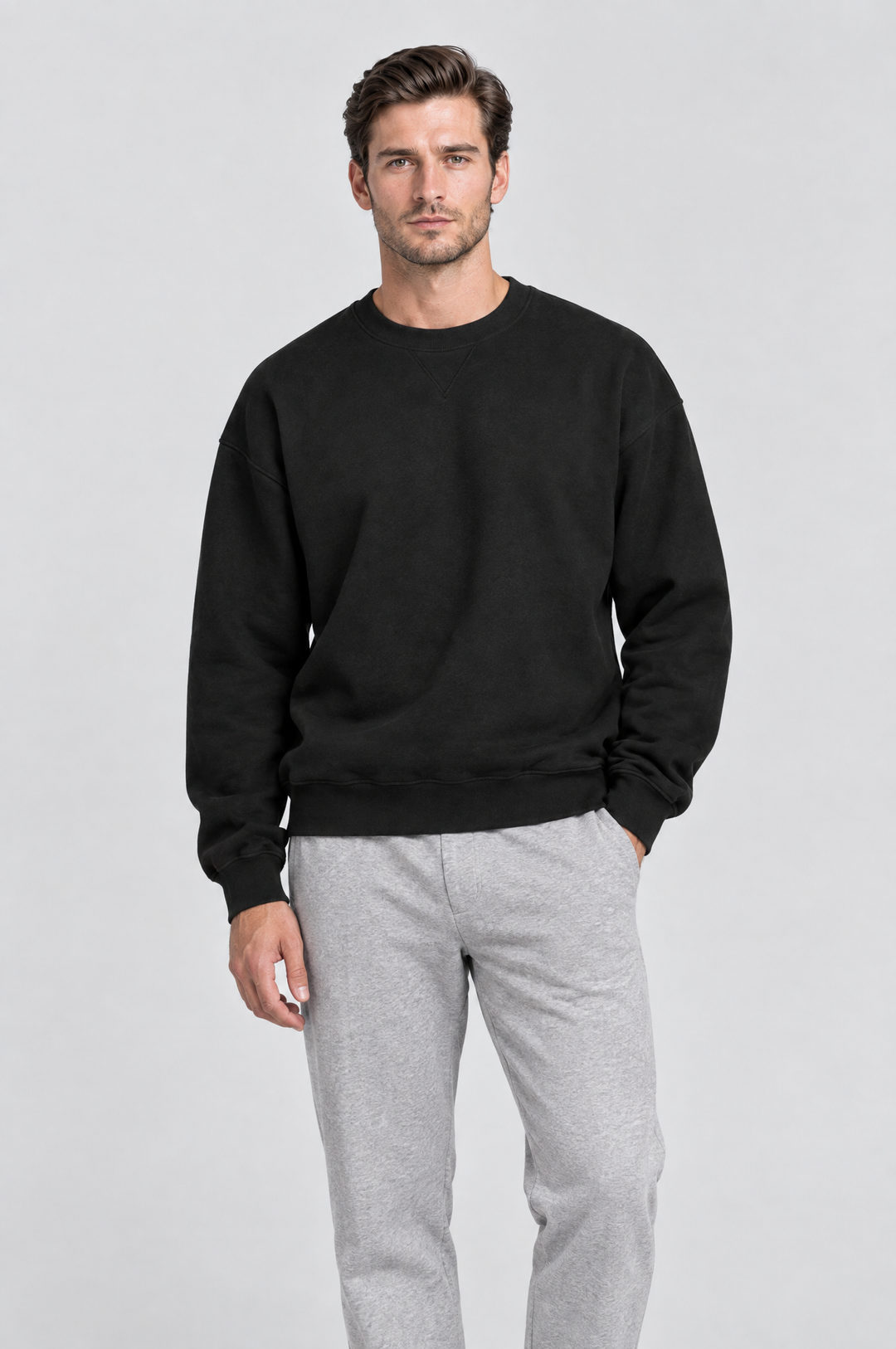 The Hackney Crewneck Sweatshirt in Black, on model, front