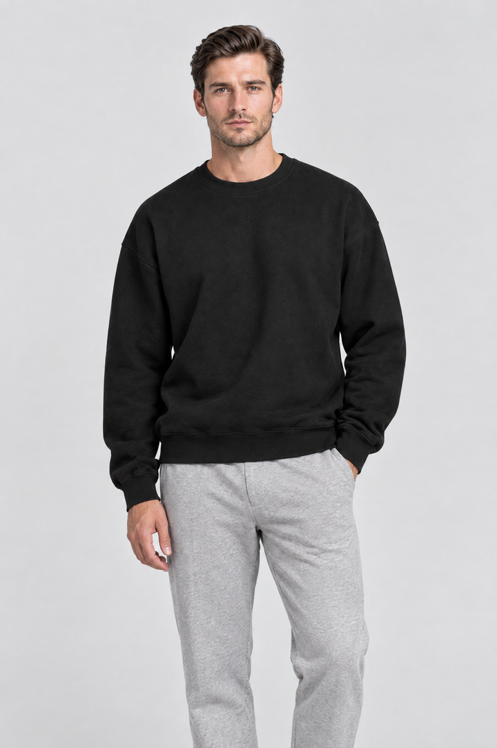 The Hackney Crewneck Sweatshirt in Black, on model, front