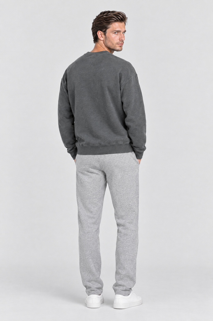 The Hackney Crewneck Sweatshirt in Charcoal, on model, back view