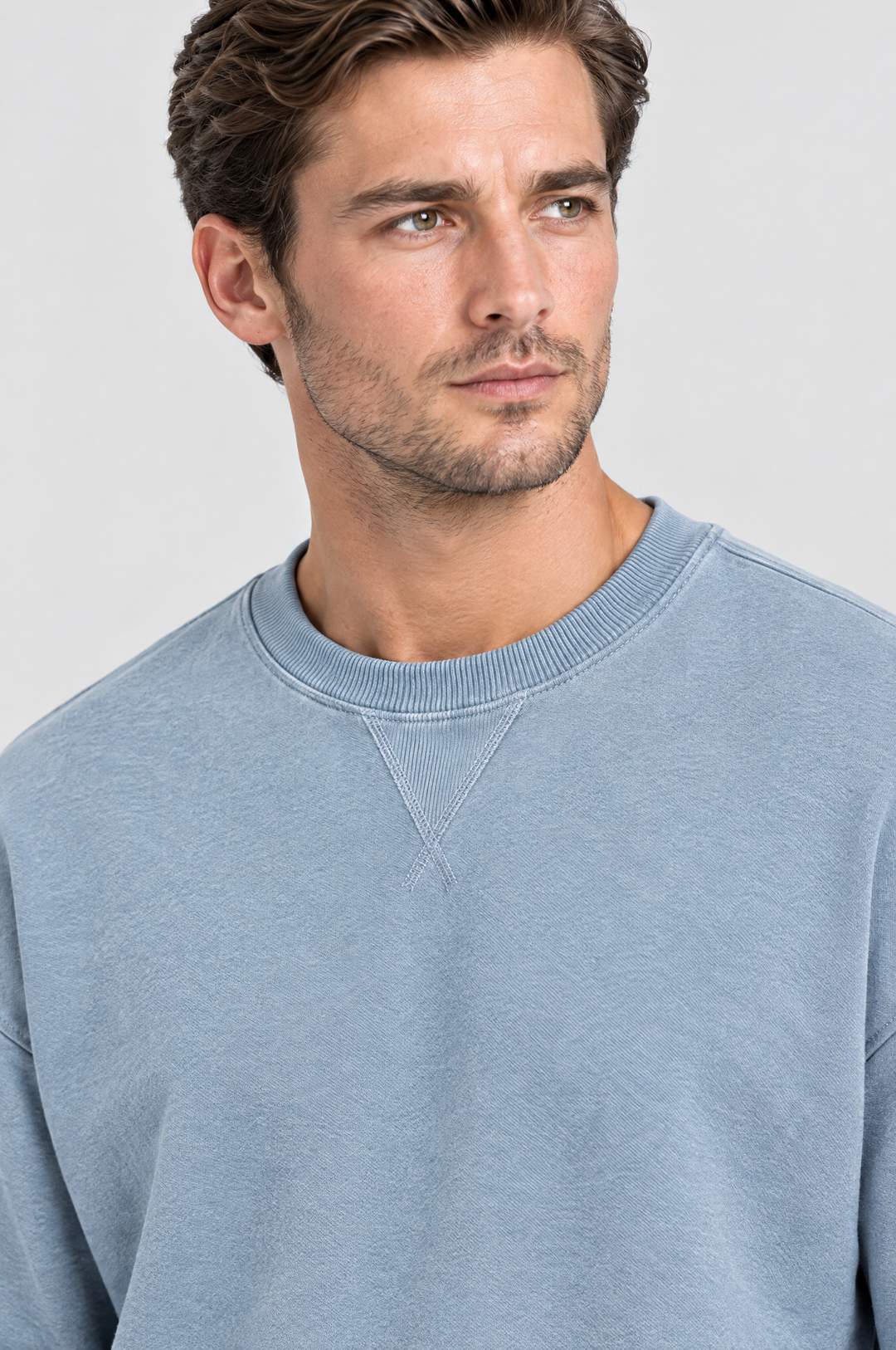 The Hackney Crewneck Sweatshirt in Dusty Blue, close-up detail