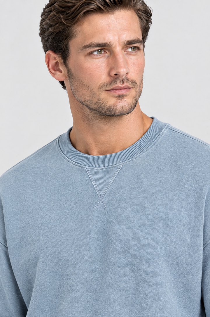 The Hackney Crewneck Sweatshirt in Dusty Blue, close-up detail