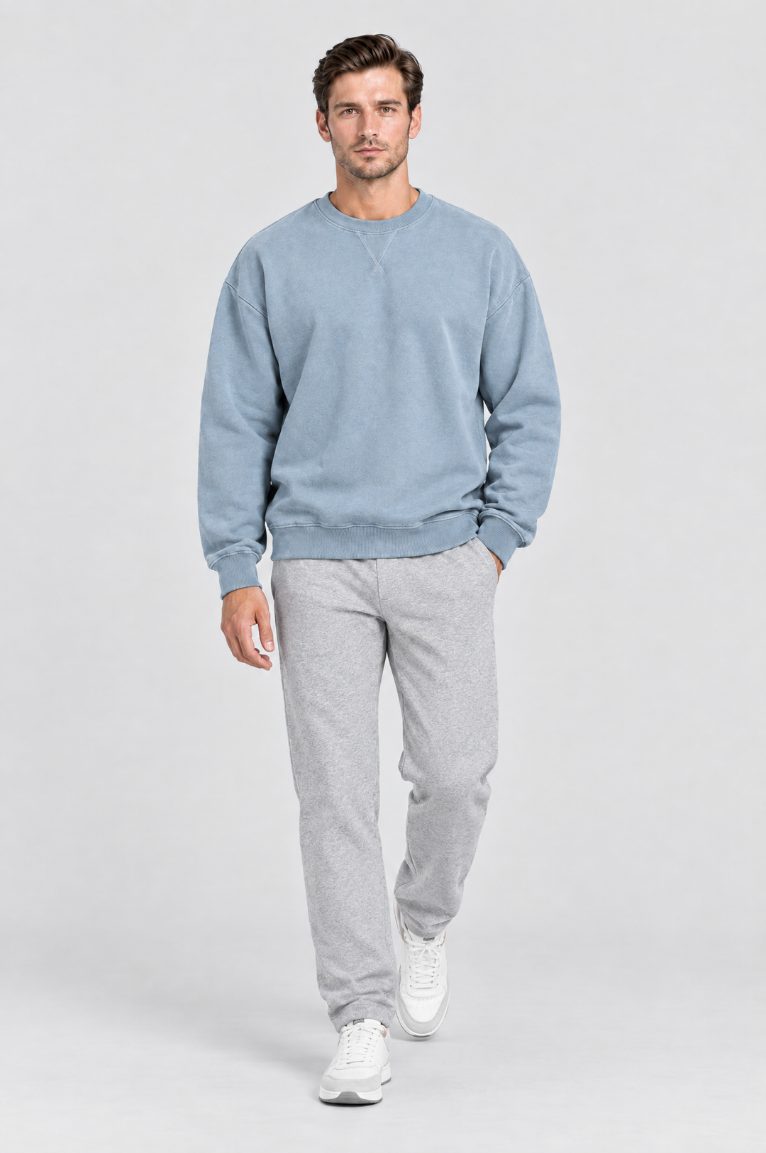 The Hackney Crewneck Sweatshirt in Dusty Blue, on model, full length