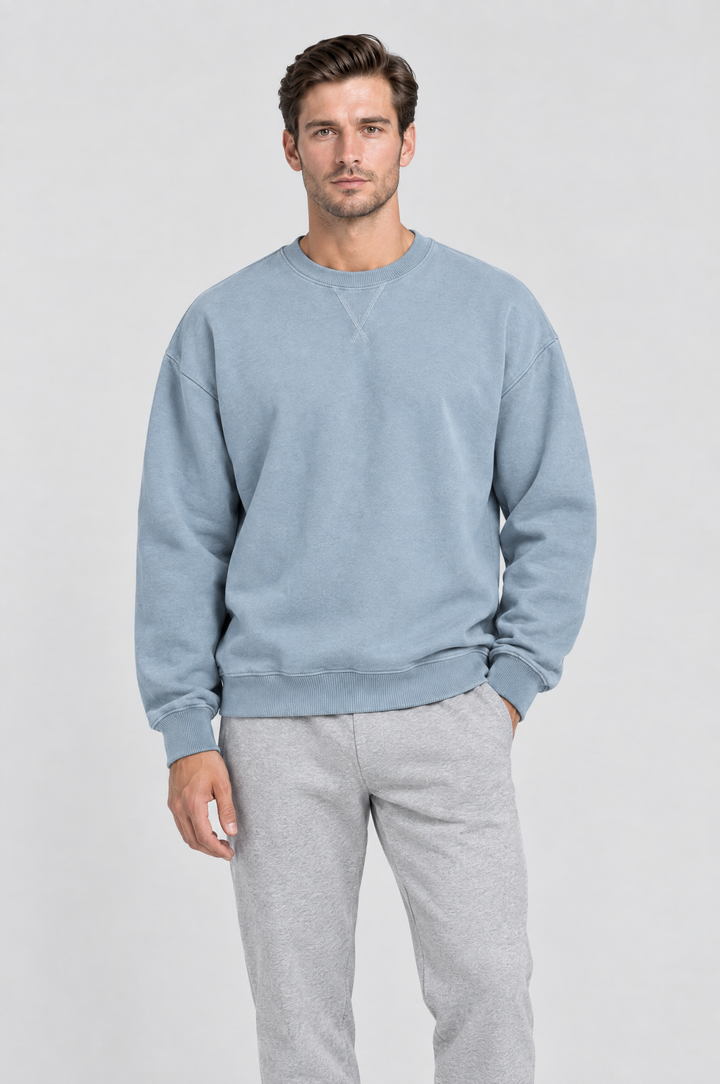 The Hackney Crewneck Sweatshirt in Dusty Blue, on model, front