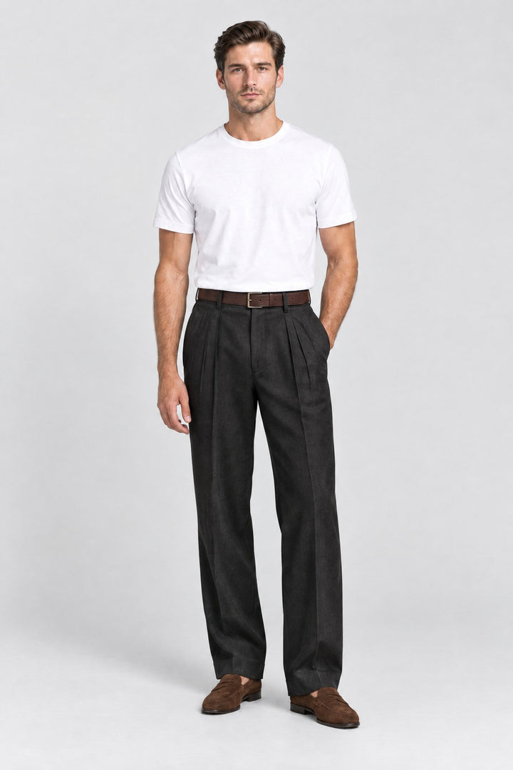 The Henley Pleated Trouser in Black worn by model
