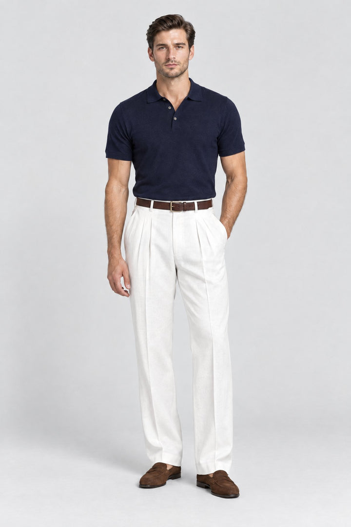 The Henley Pleated Trouser in Off White worn by model
