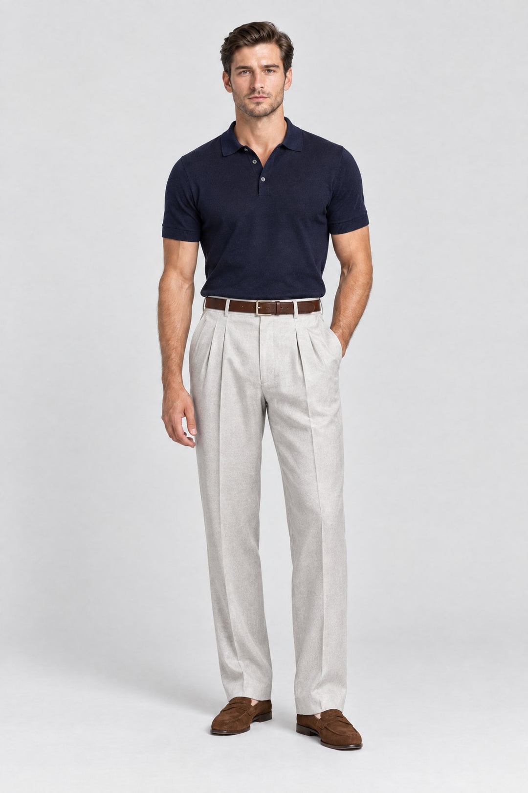 The Henley Pleated Trouser in Pale Grey worn by model