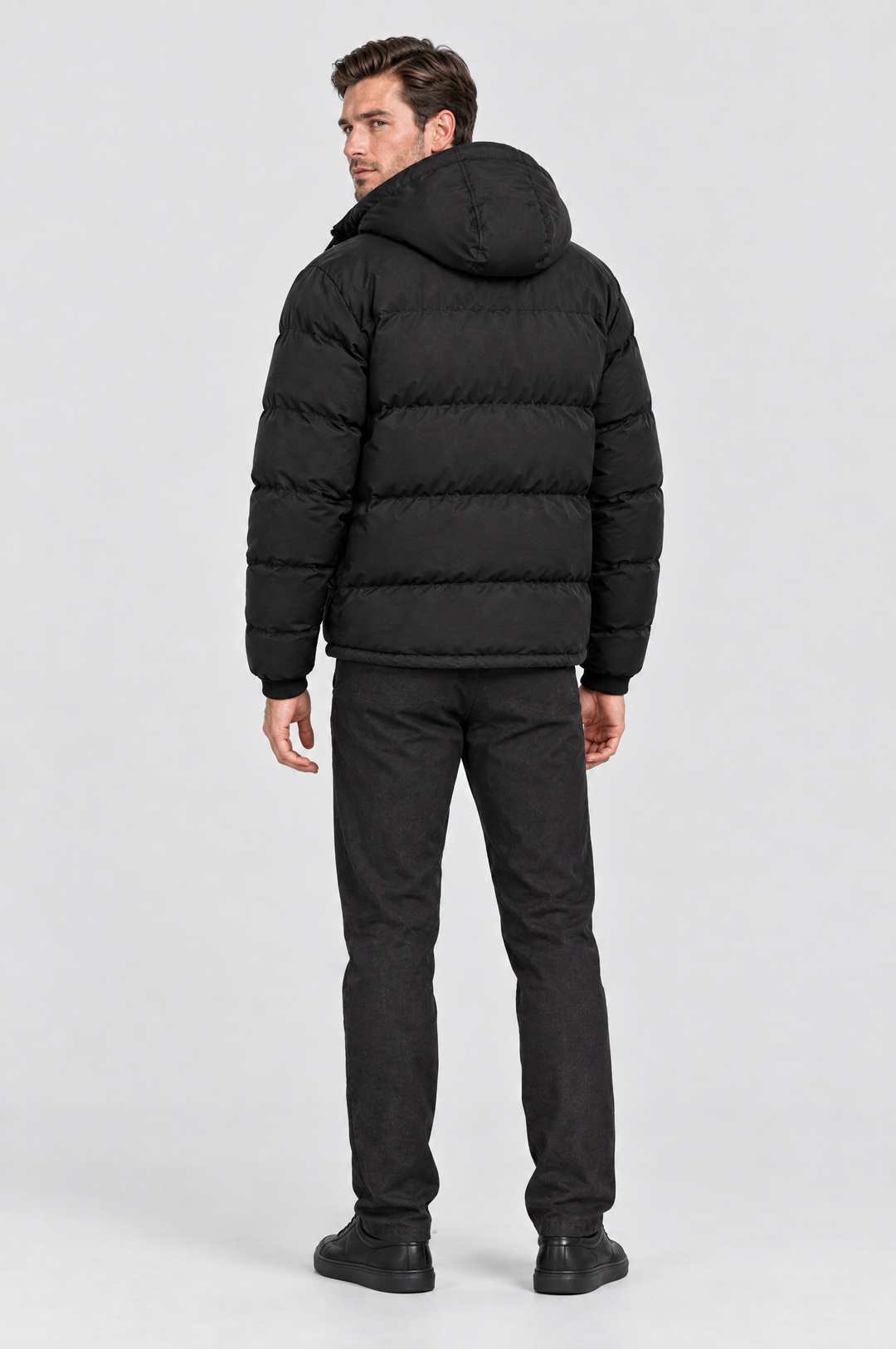 The Highgate Hooded Puffer in Black, on model, back view