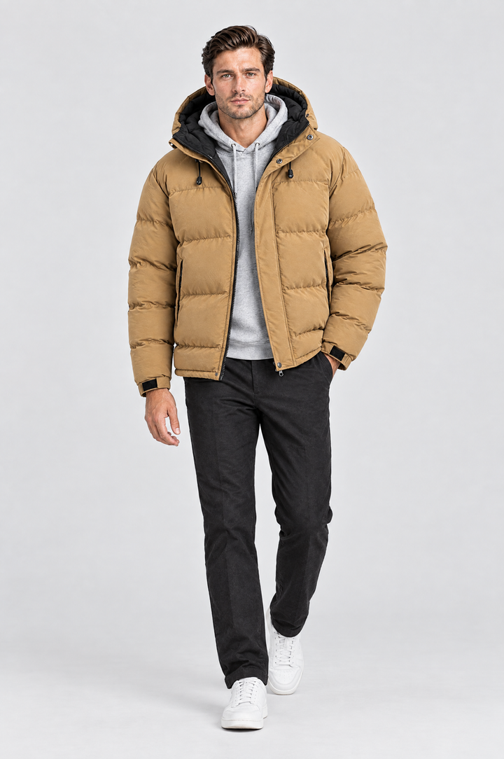 The Highgate Hooded Puffer in Tan, on model, full length