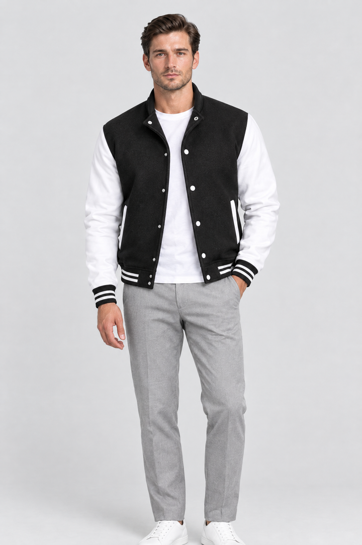 The Islington Varsity Jacket in Black, on model, front