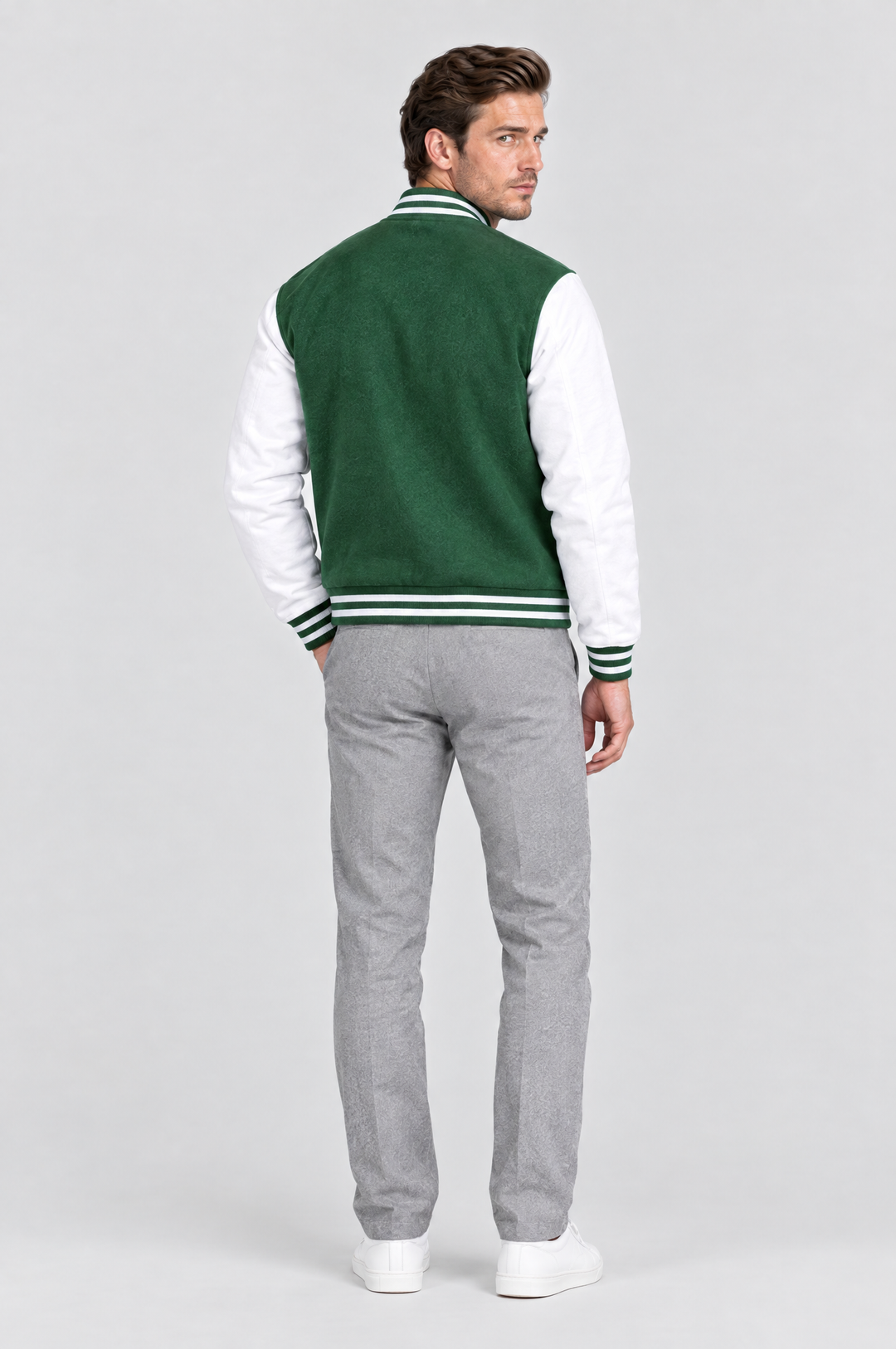 The Islington Varsity Jacket in Bottle Green, on model, back view