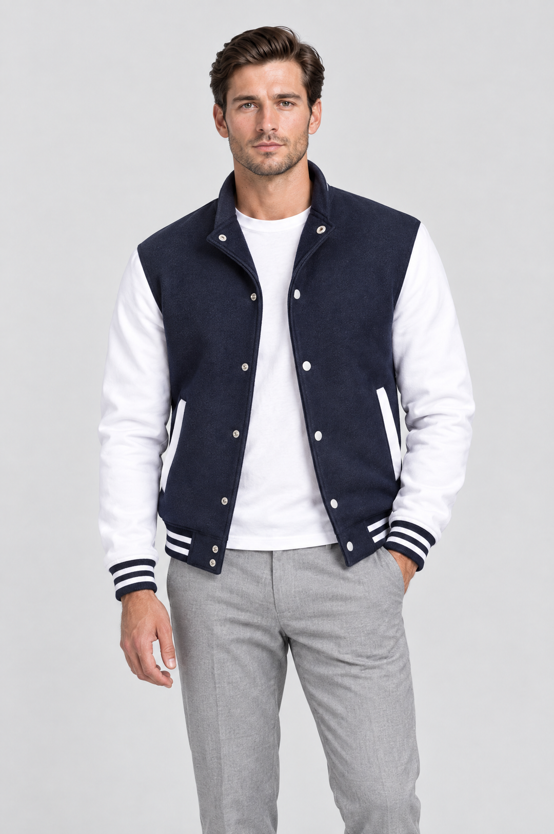 The Islington Varsity Jacket in Navy, on model, front