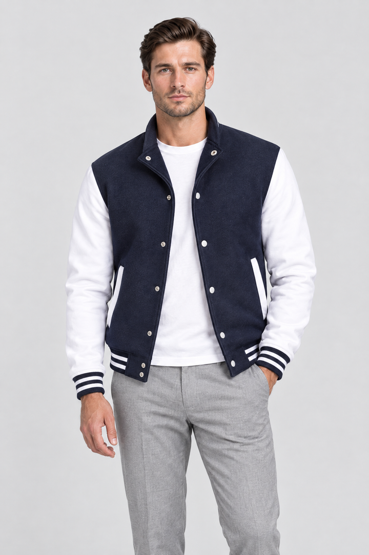 The Islington Varsity Jacket in Navy, on model, front