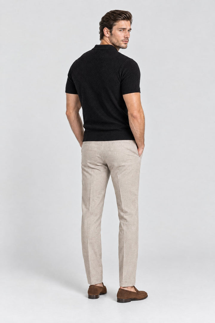 The Mayfair Knitted Polo in Black, back view