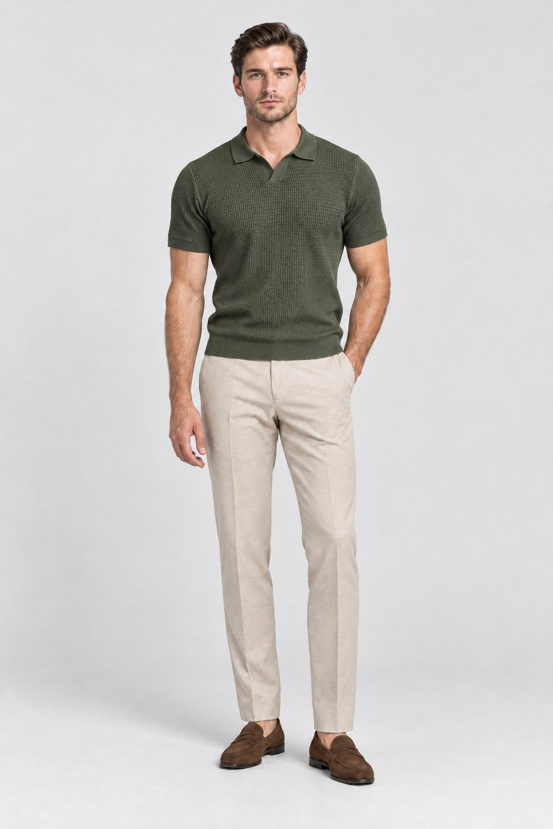 The Mayfair Knitted Polo in Olive worn by model — full length