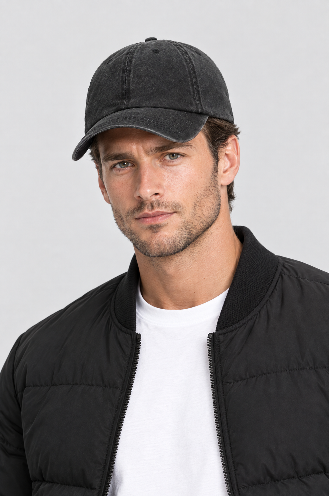 The Piccadilly Washed Cap in Washed Black, on model, front