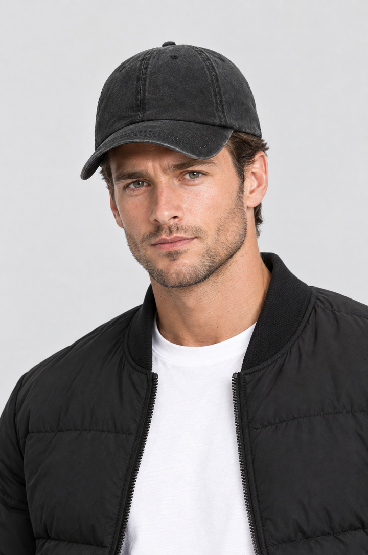 The Piccadilly Washed Cap in Washed Black, on model, front