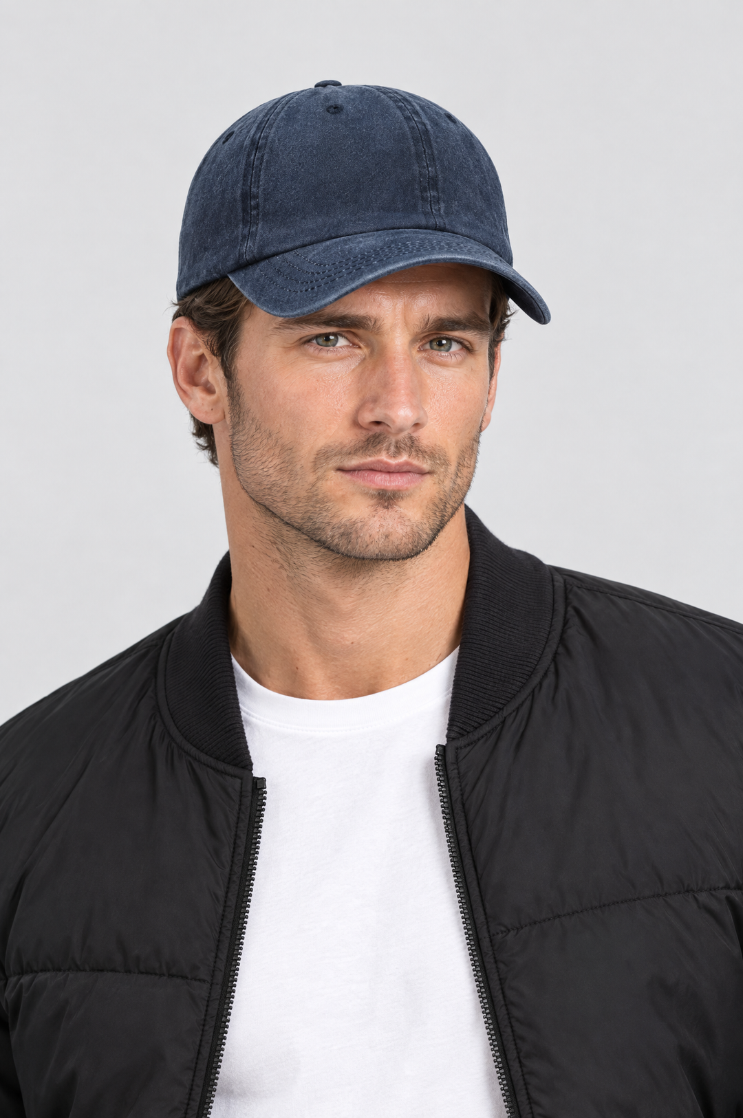 The Piccadilly Washed Cap in Washed Navy, on model, front