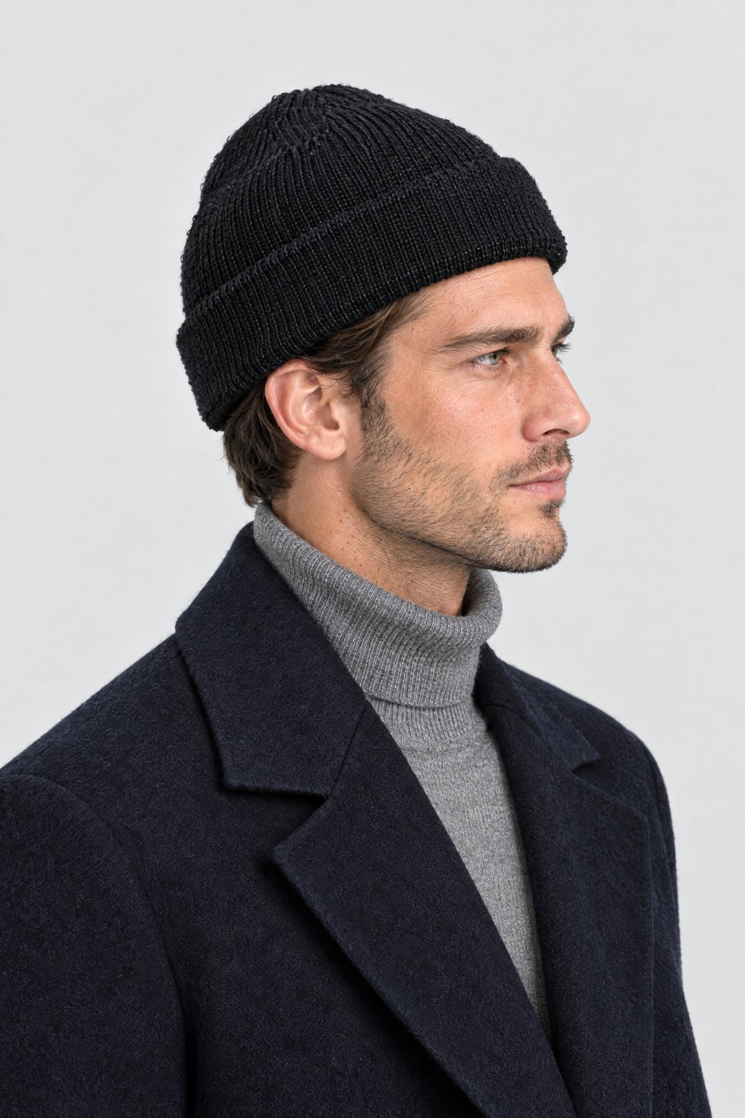 The Ribbed Beanie in Black, side view