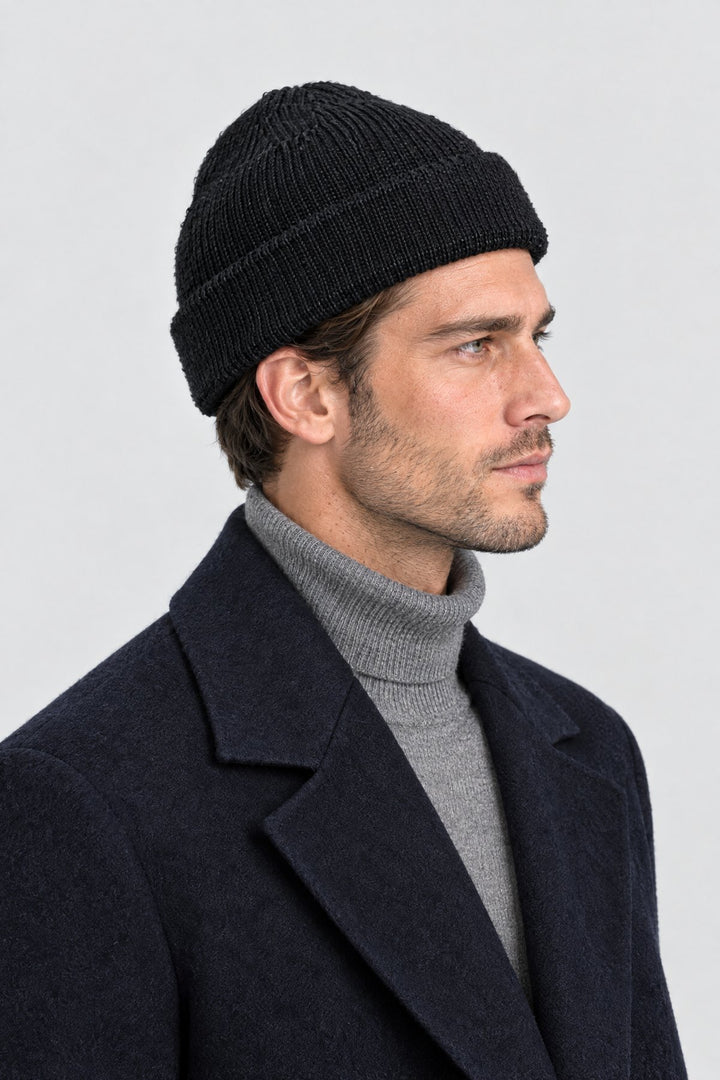 The Ribbed Beanie in Black, side view