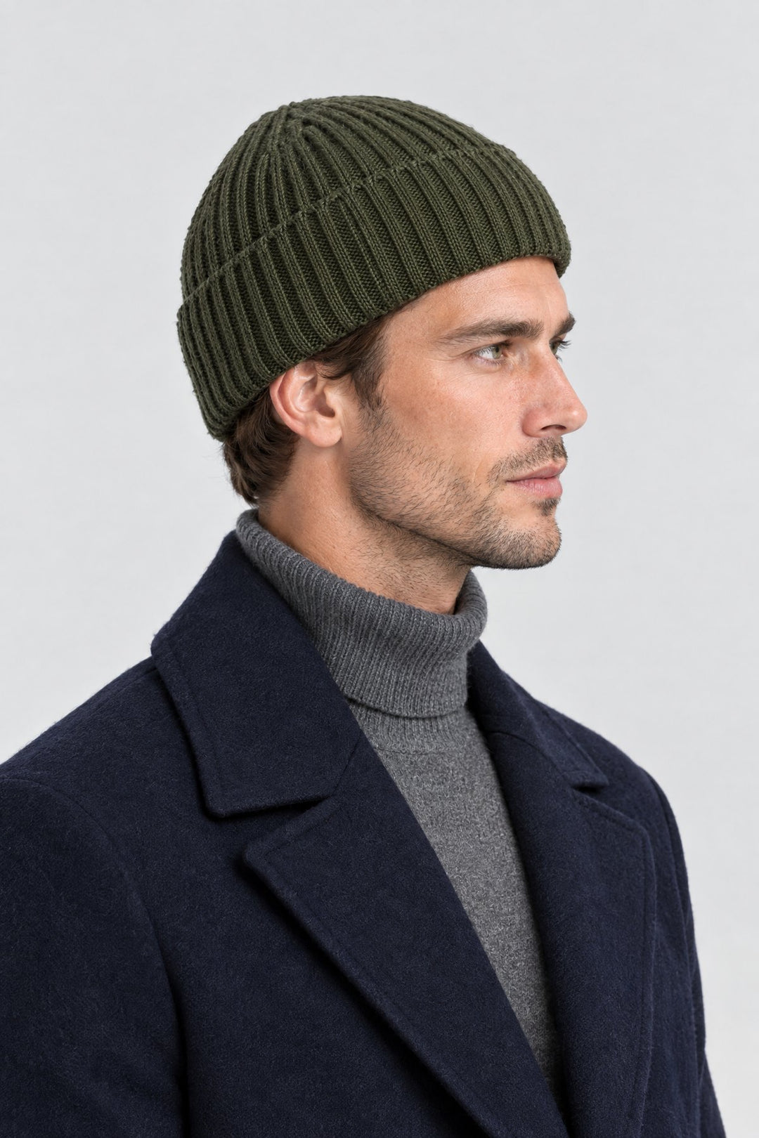 The Ribbed Beanie in Olive, side view