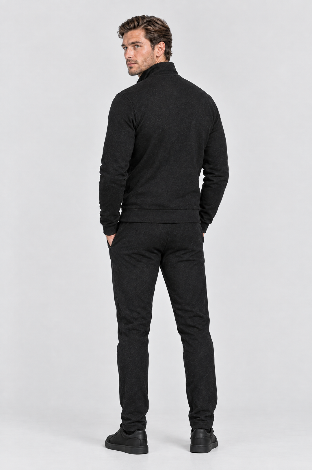 The Stratford Track Jacket in Black, on model, back view