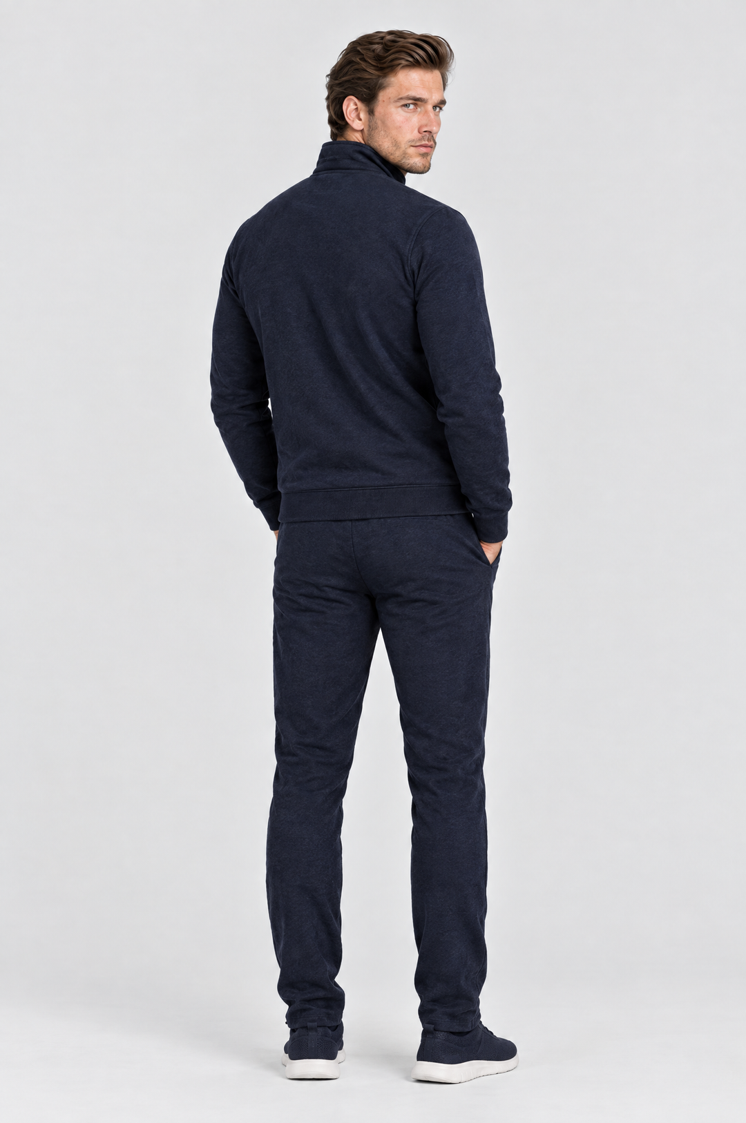 The Stratford Track Jacket in Navy, on model, back view