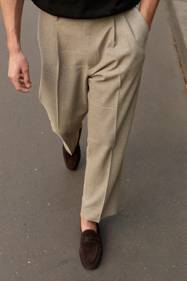Pleated stone trousers with brown suede loafers