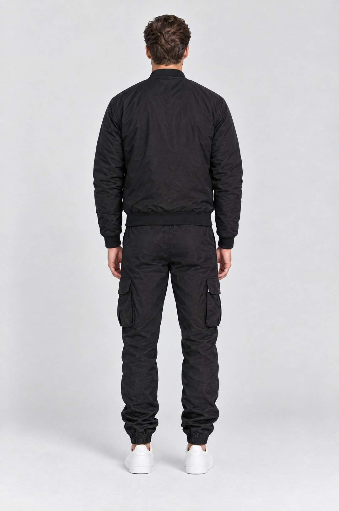 The Wapping Cargo Jogger in Black, on model, back view